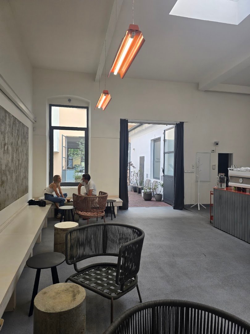 Interior of TYPIKA Karlín, specialty coffee shop in Prague