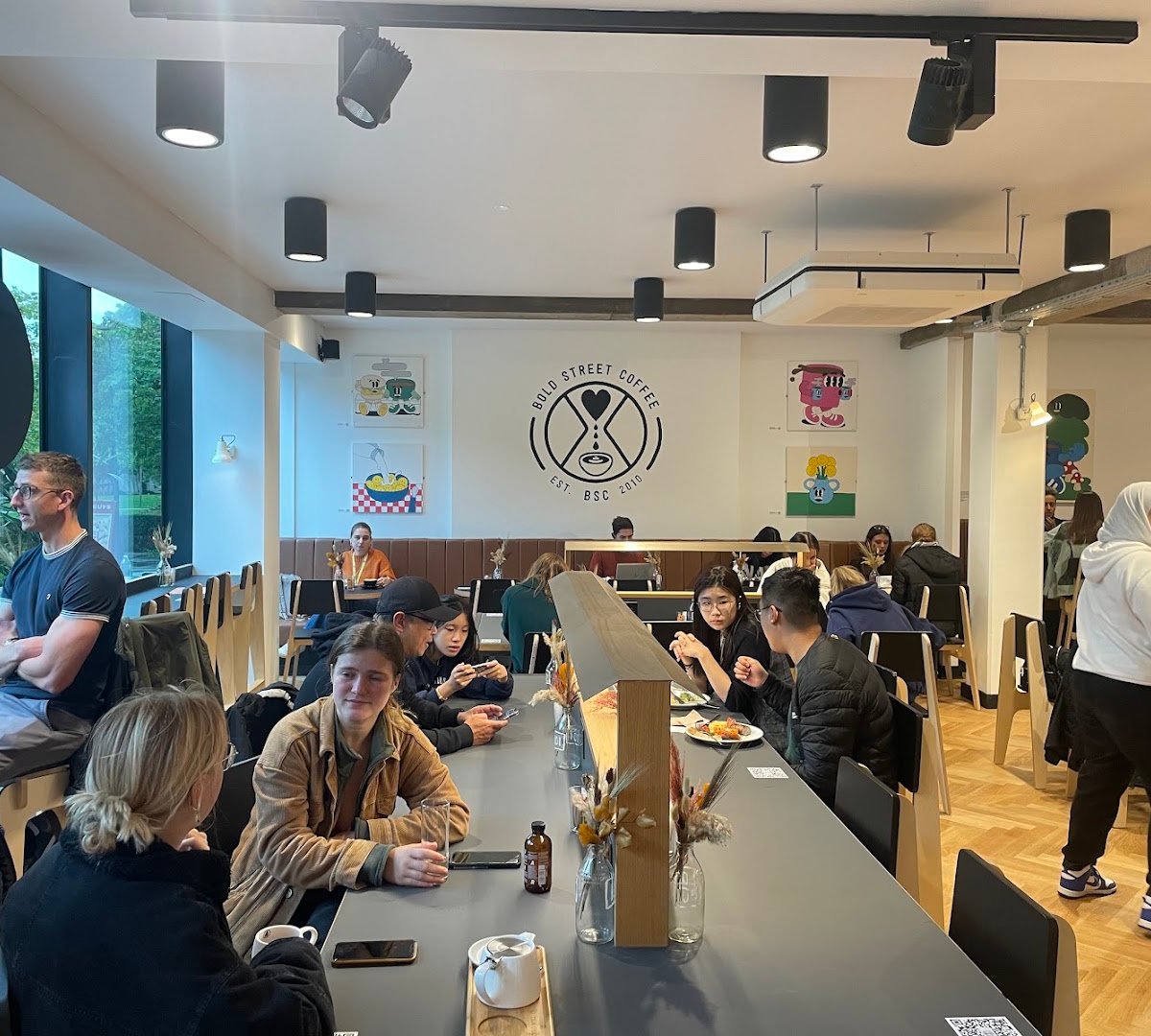 Interior of Bold Street Coffee University Green, specialty coffee shop in Manchester