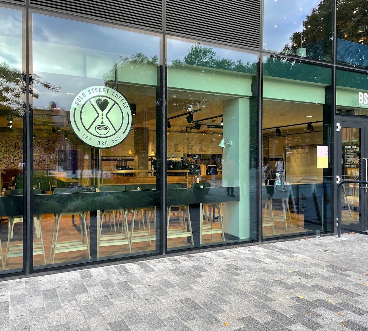 Storefront of Bold Street Coffee University Green, specialty coffee shop in Manchester