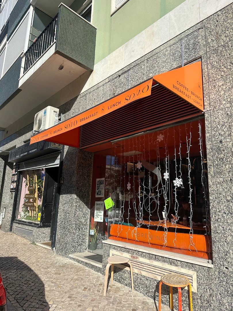 Storefront of SoLo Brewing Coffee Lab, specialty coffee shop in Lisbon