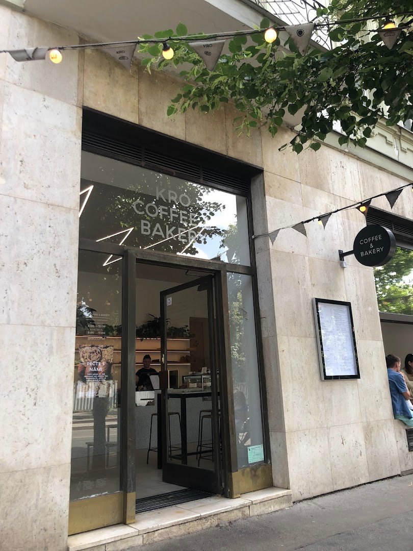 Storefront of Kro Coffee, specialty coffee shop in Prague