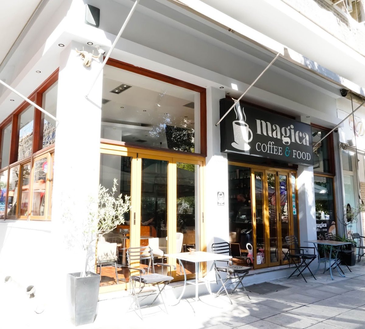 Storefront of Magica coffee food, specialty coffee shop in Athens