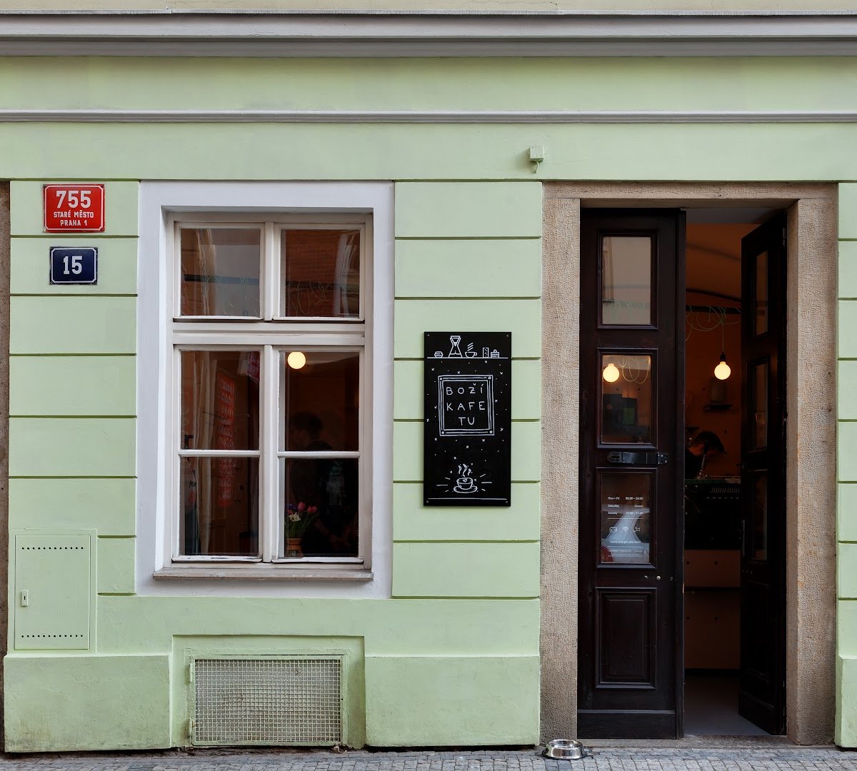 Storefront of onesip coffee, specialty coffee shop in Prague