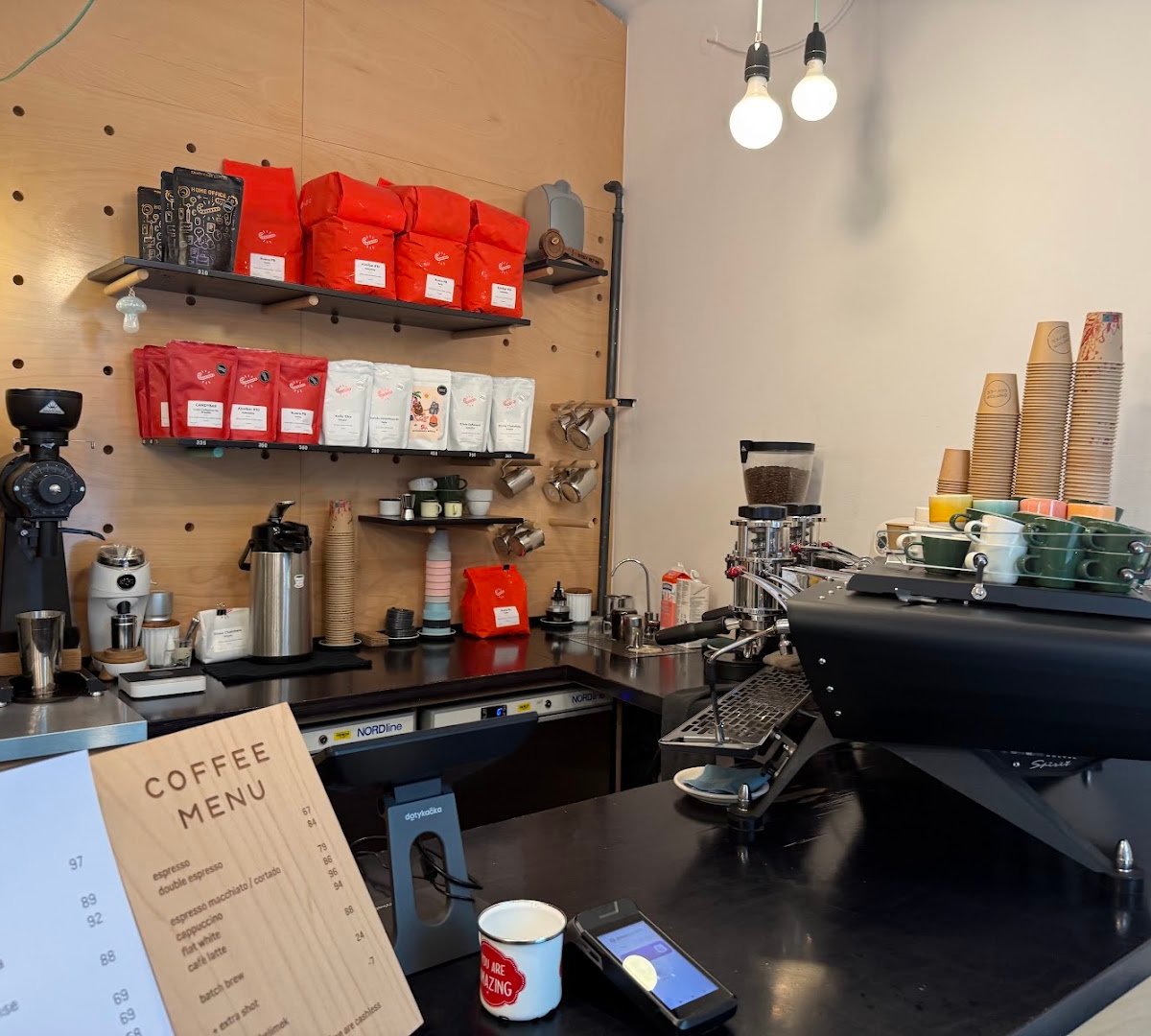 Interior of onesip coffee, specialty coffee shop in Prague