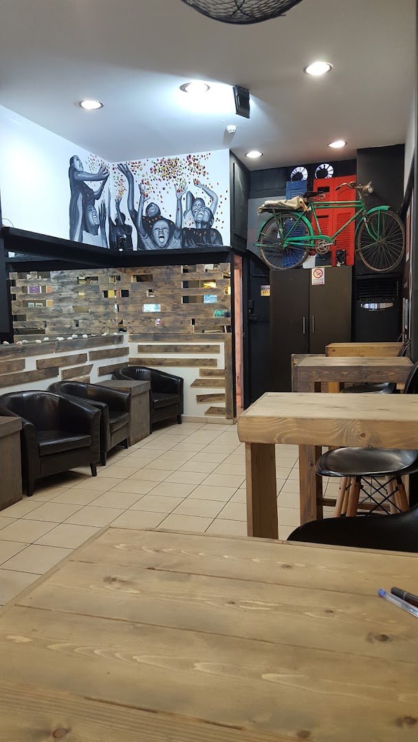 Interior of Five 5 Grinders, specialty coffee shop in Athens