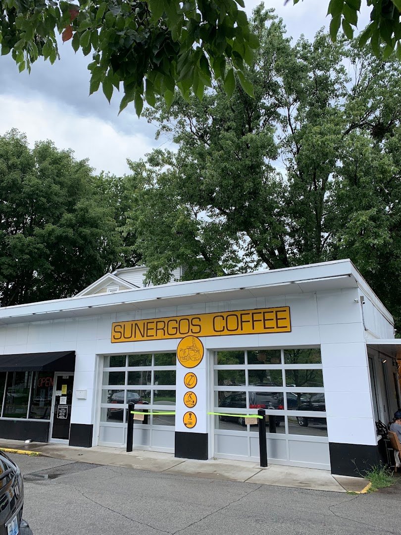 Storefront of Sunergos Coffee, specialty coffee shop in Louisville