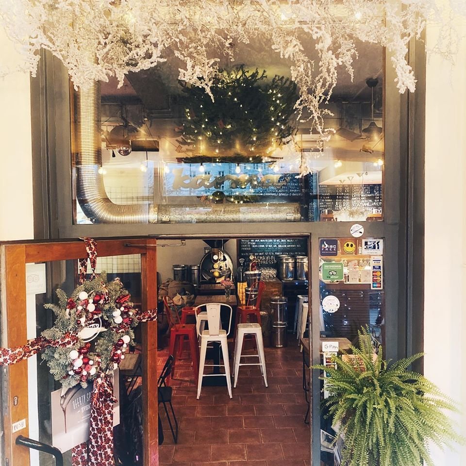 Storefront of Coffee Karma, specialty coffee shop in Warsaw