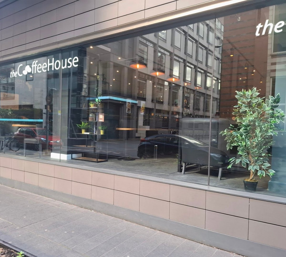 Storefront of Coffee House City Tower, specialty coffee shop in Manchester