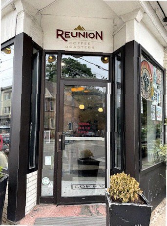 Storefront of Reunion Coffee Roasters, specialty coffee shop in Toronto