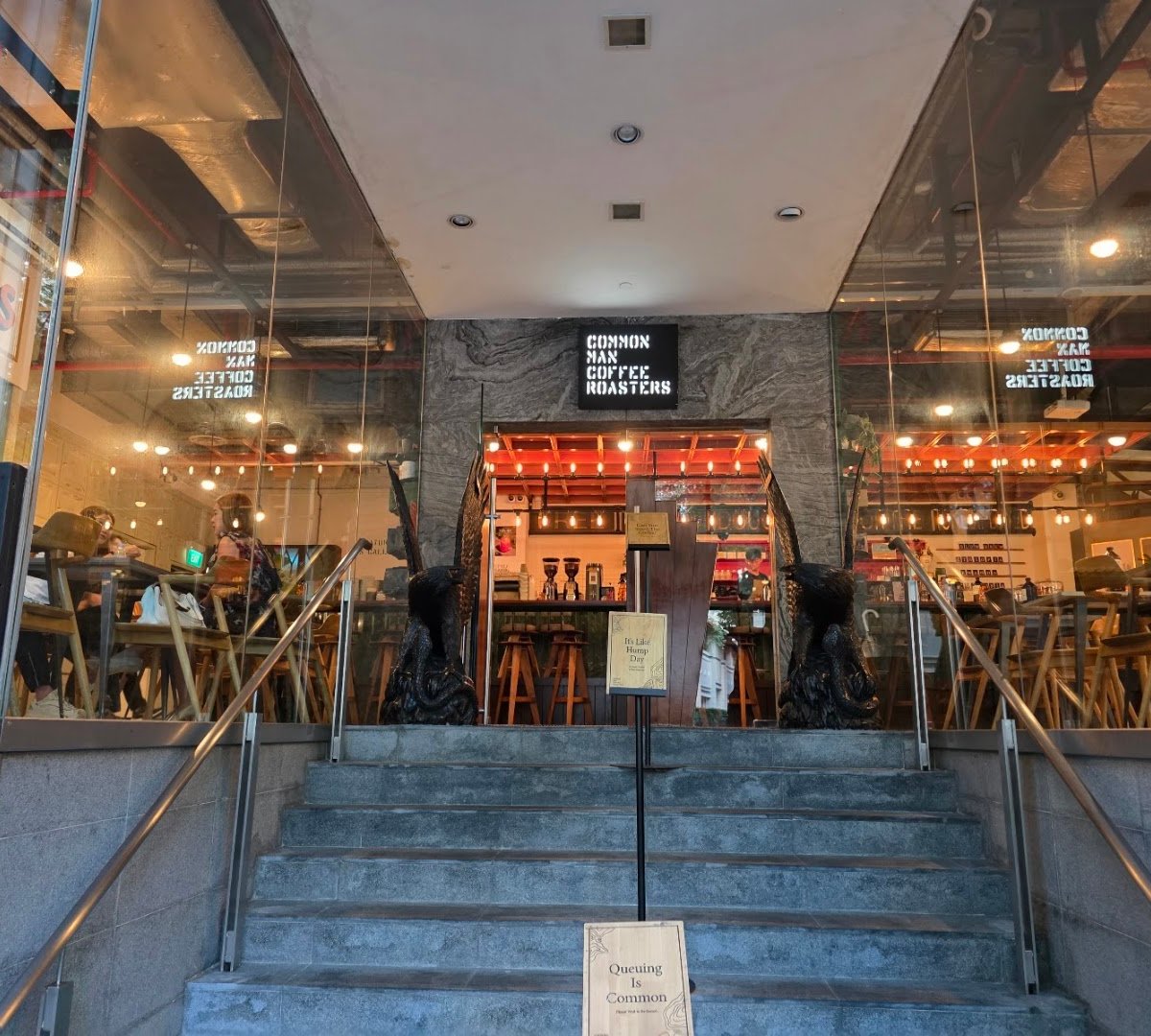 Storefront of Common Man Coffee Roasters - Martin Road, specialty coffee shop in Singapore