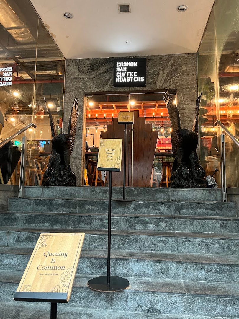 Storefront of Common Man Coffee Roasters - Martin Road, specialty coffee shop in Singapore