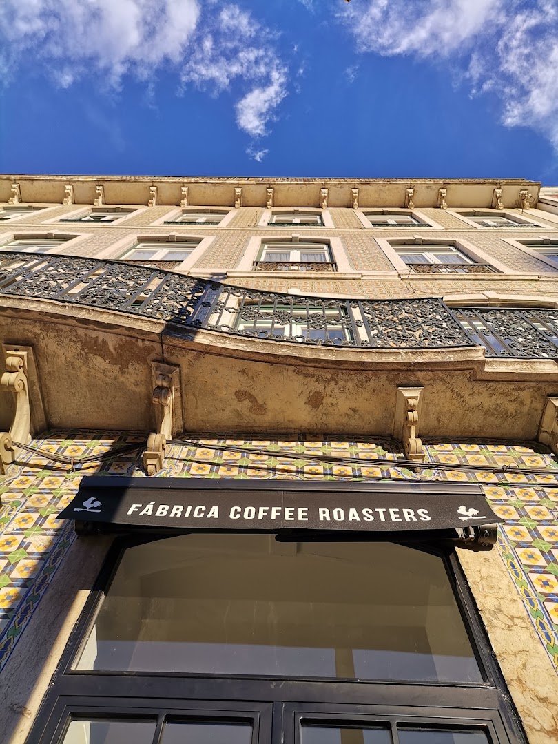 Storefront of FÁBRICA COFFEE ROASTERS - SANTOS, specialty coffee shop in Lisbon