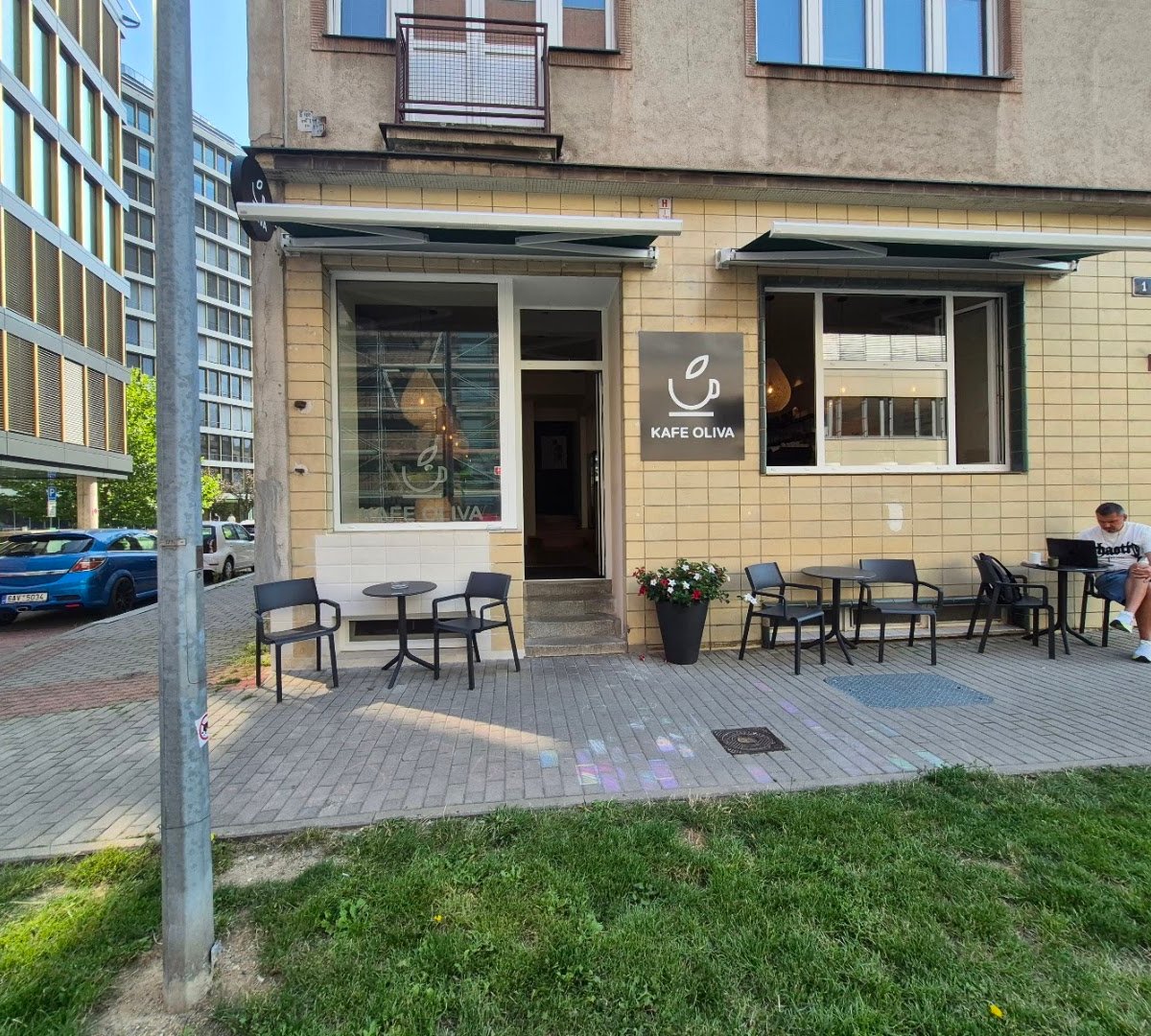 Storefront of Kafe Oliva, specialty coffee shop in Prague