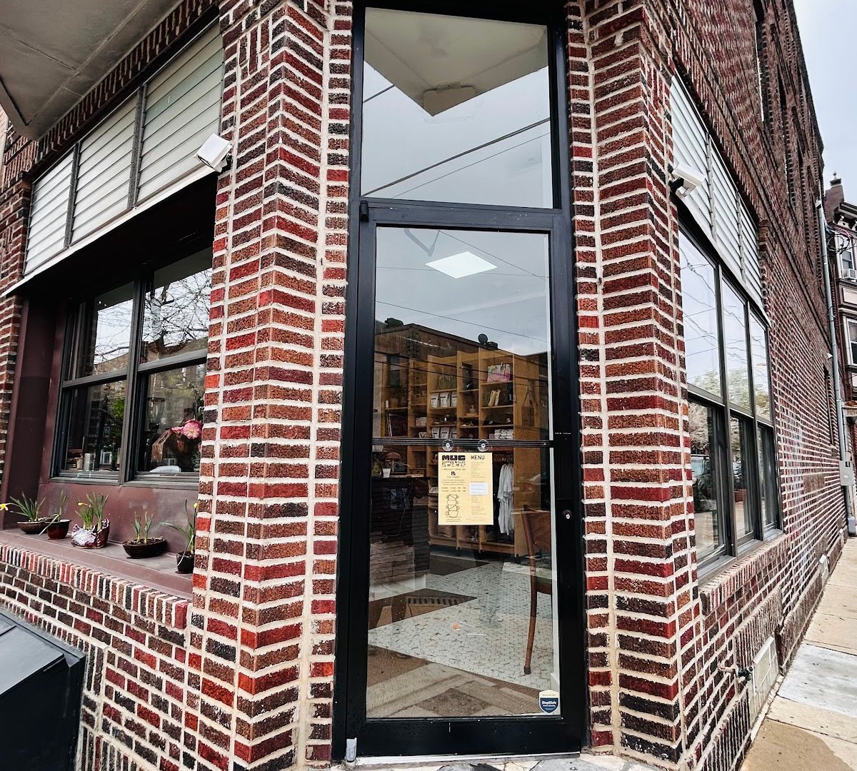 Storefront of Mug Coffee & Clay, specialty coffee shop in Philadelphia