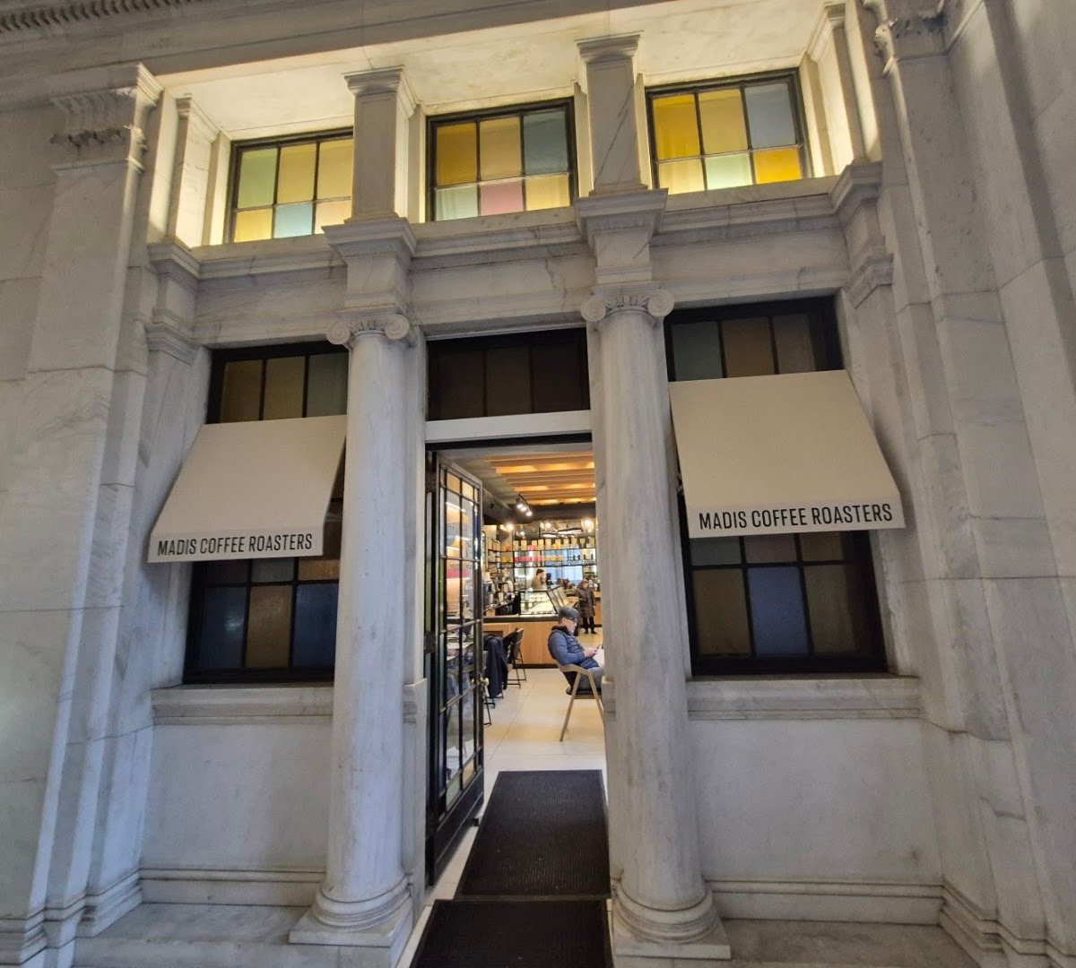 Storefront of Madis Coffee Roasters, specialty coffee shop in Philadelphia