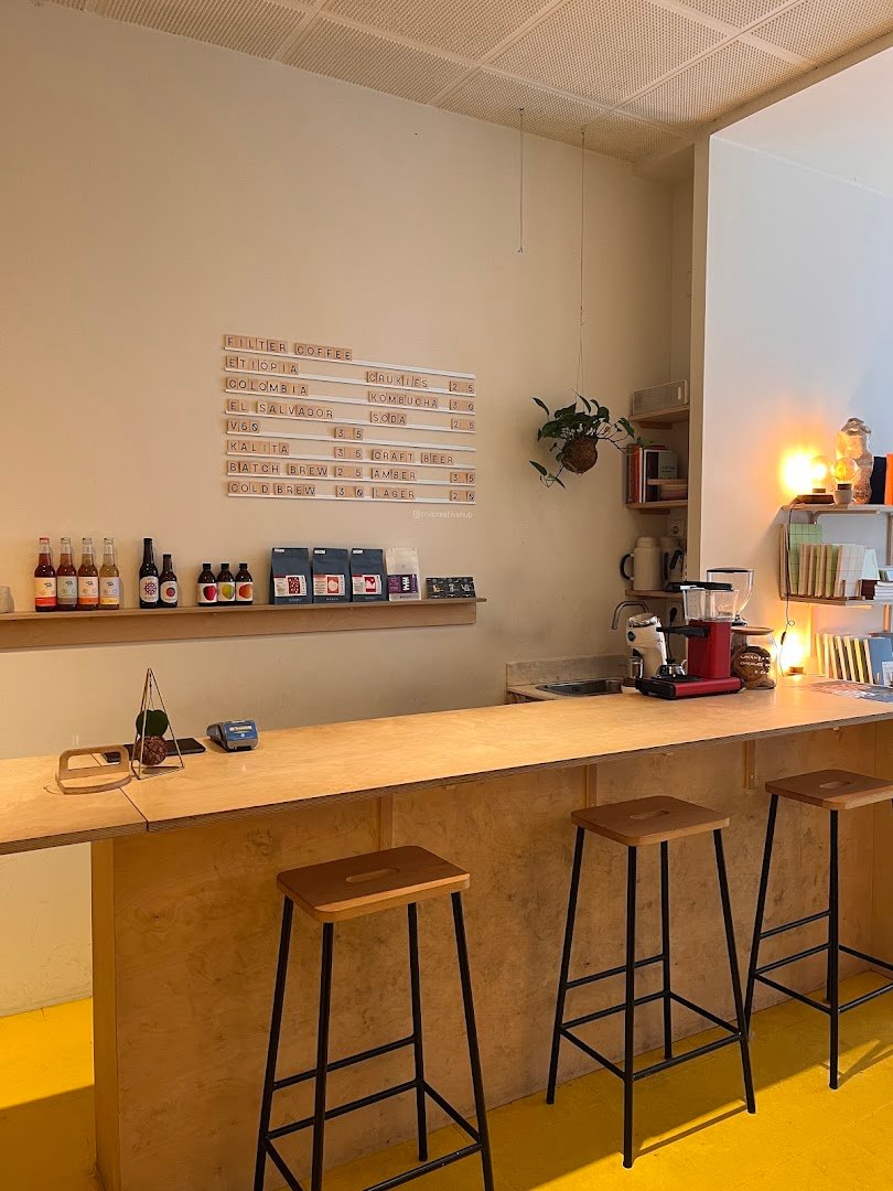 Interior of Senzu Coffee Roasters, specialty coffee shop in Porto