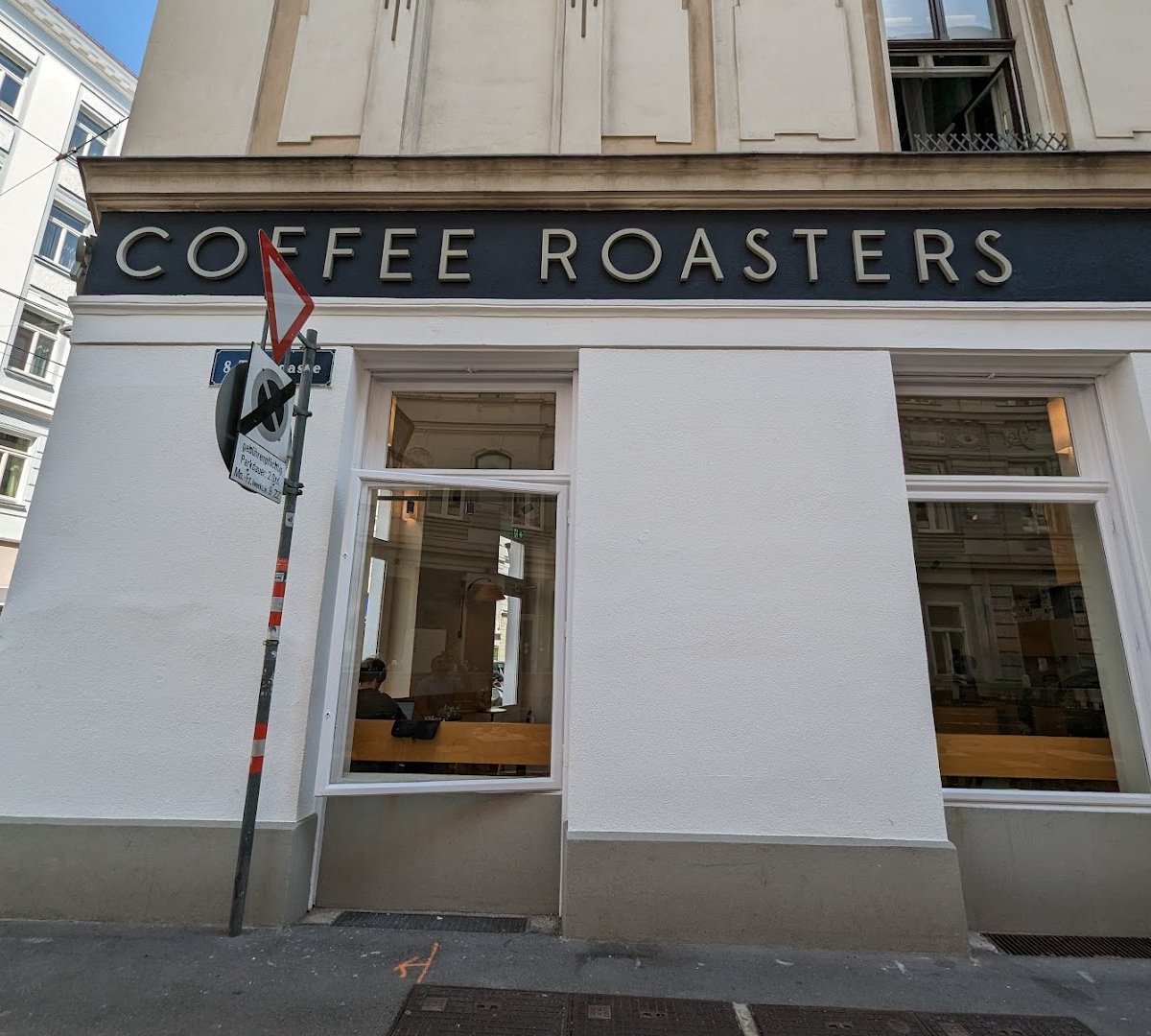 Storefront of Jonas Reindl Coffee Roasters, specialty coffee shop in Vienna