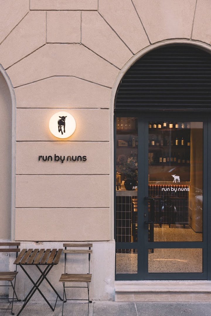 Storefront of Run by Nuns, specialty coffee shop in Rome