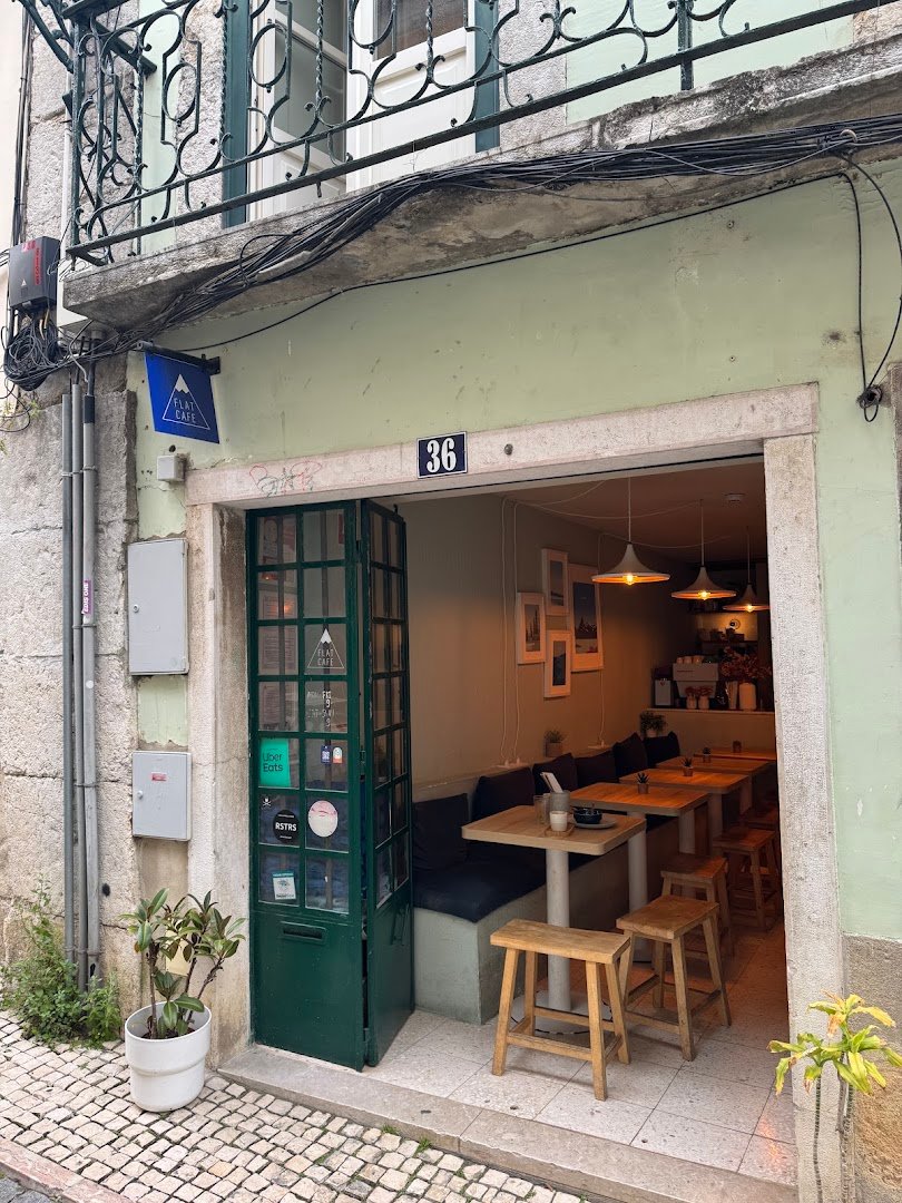 Storefront of Flat Café, specialty coffee shop in Lisbon