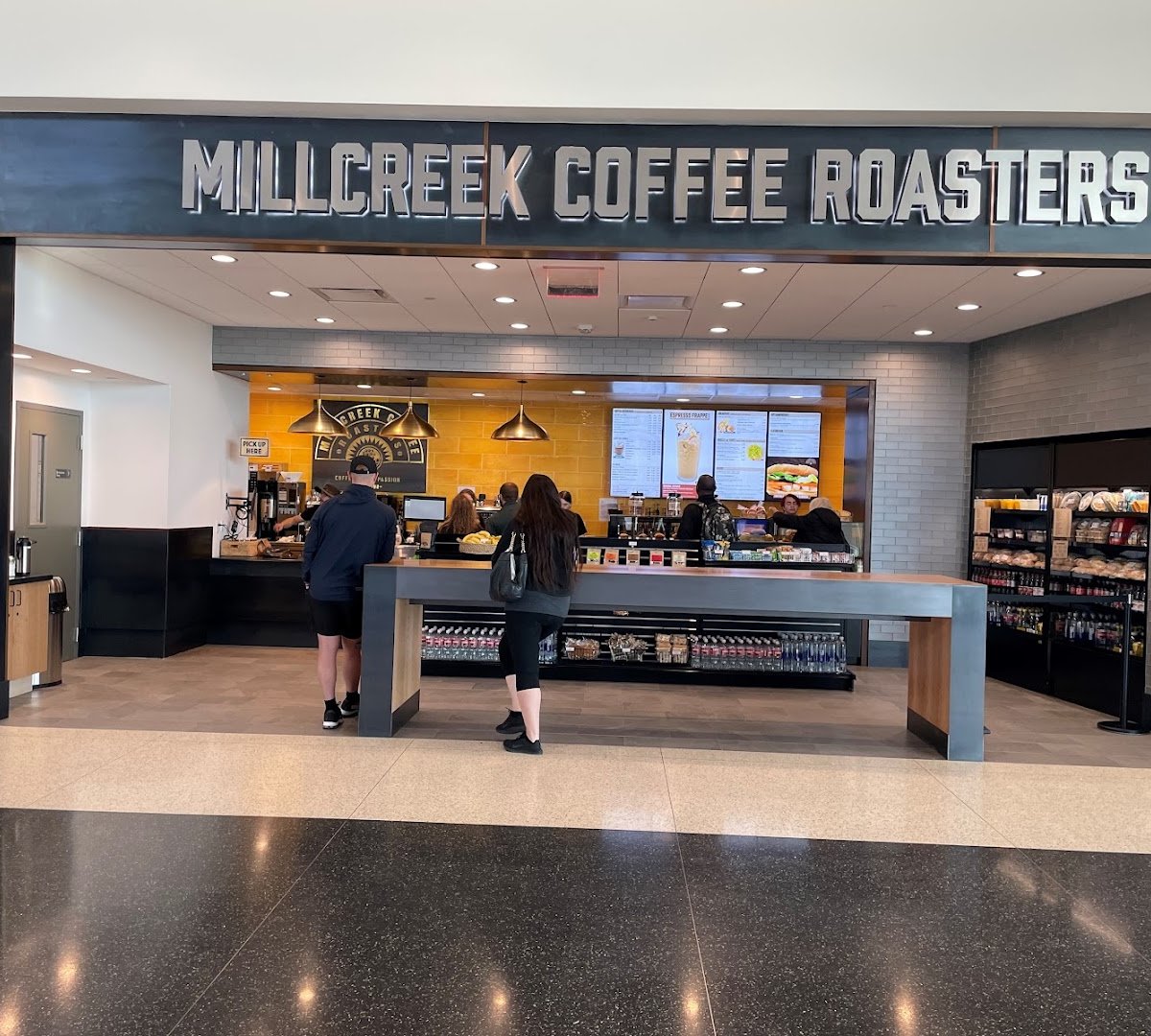 Storefront of Millcreek Coffee Roasters, specialty coffee shop in Salt Lake City
