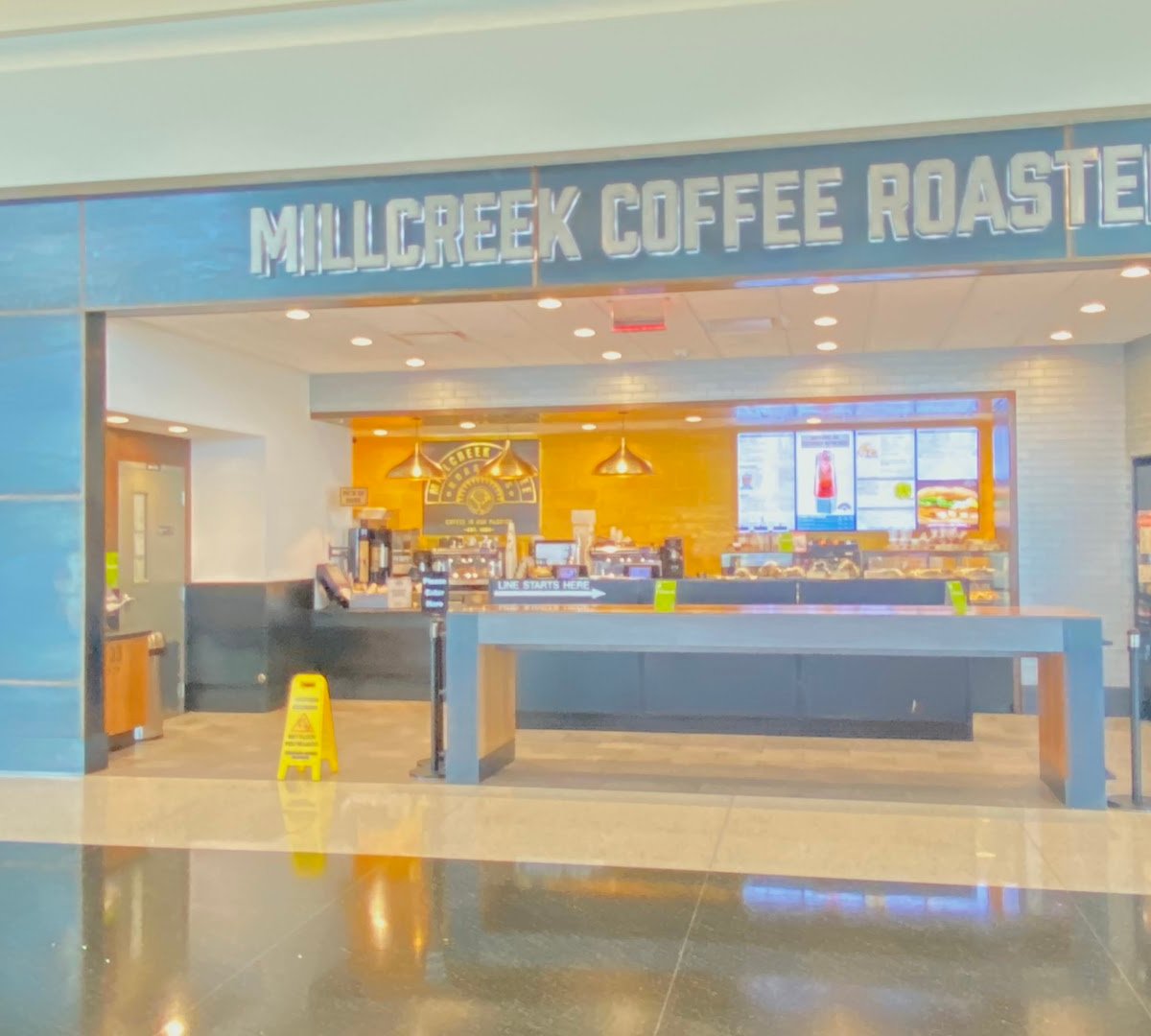 Storefront of Millcreek Coffee Roasters, specialty coffee shop in Salt Lake City