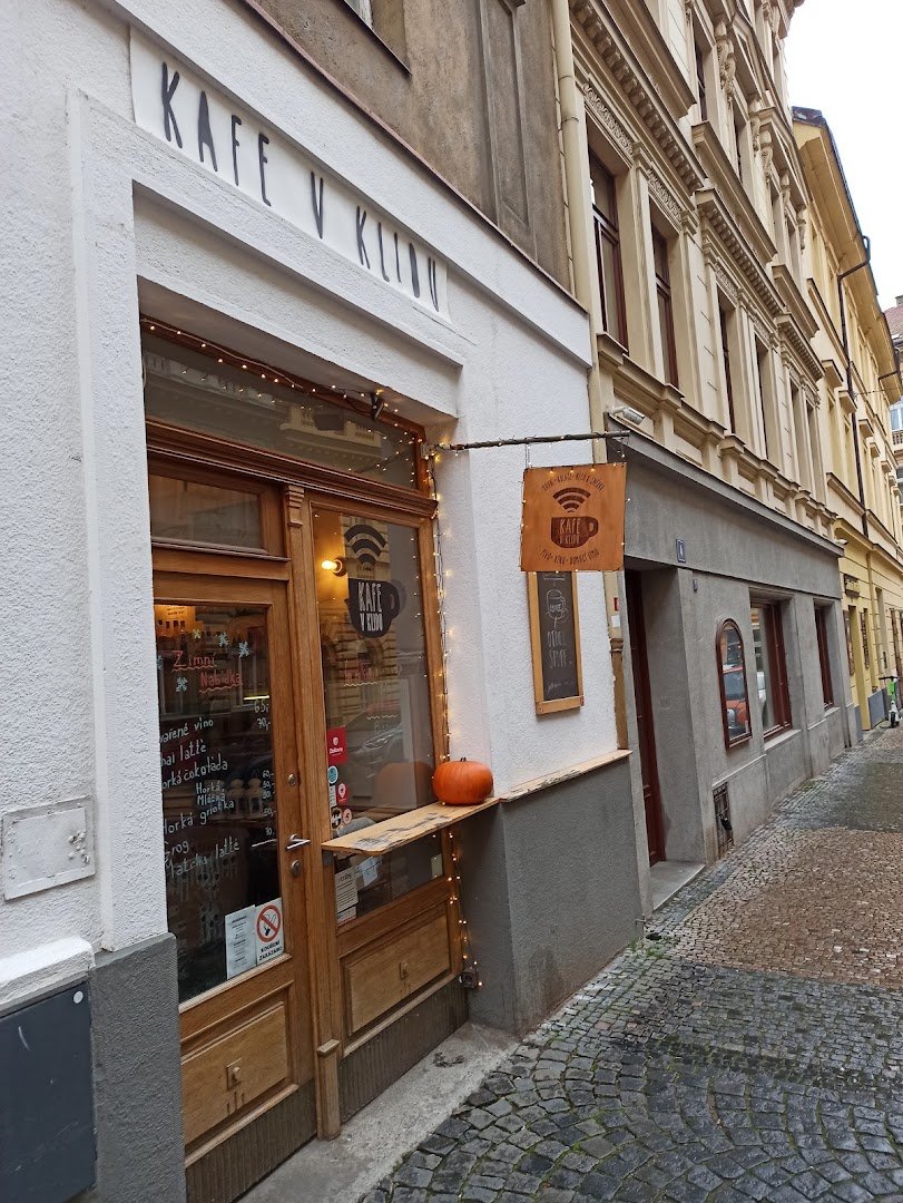 Storefront of Kafe v Klidu, specialty coffee shop in Prague