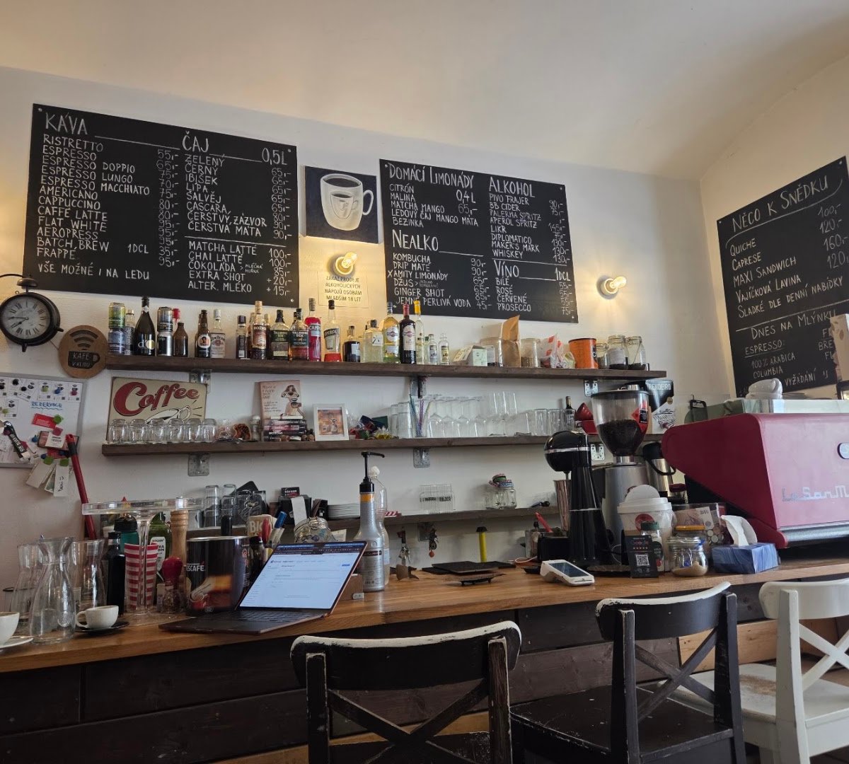 Interior of Kafe v Klidu, specialty coffee shop in Prague