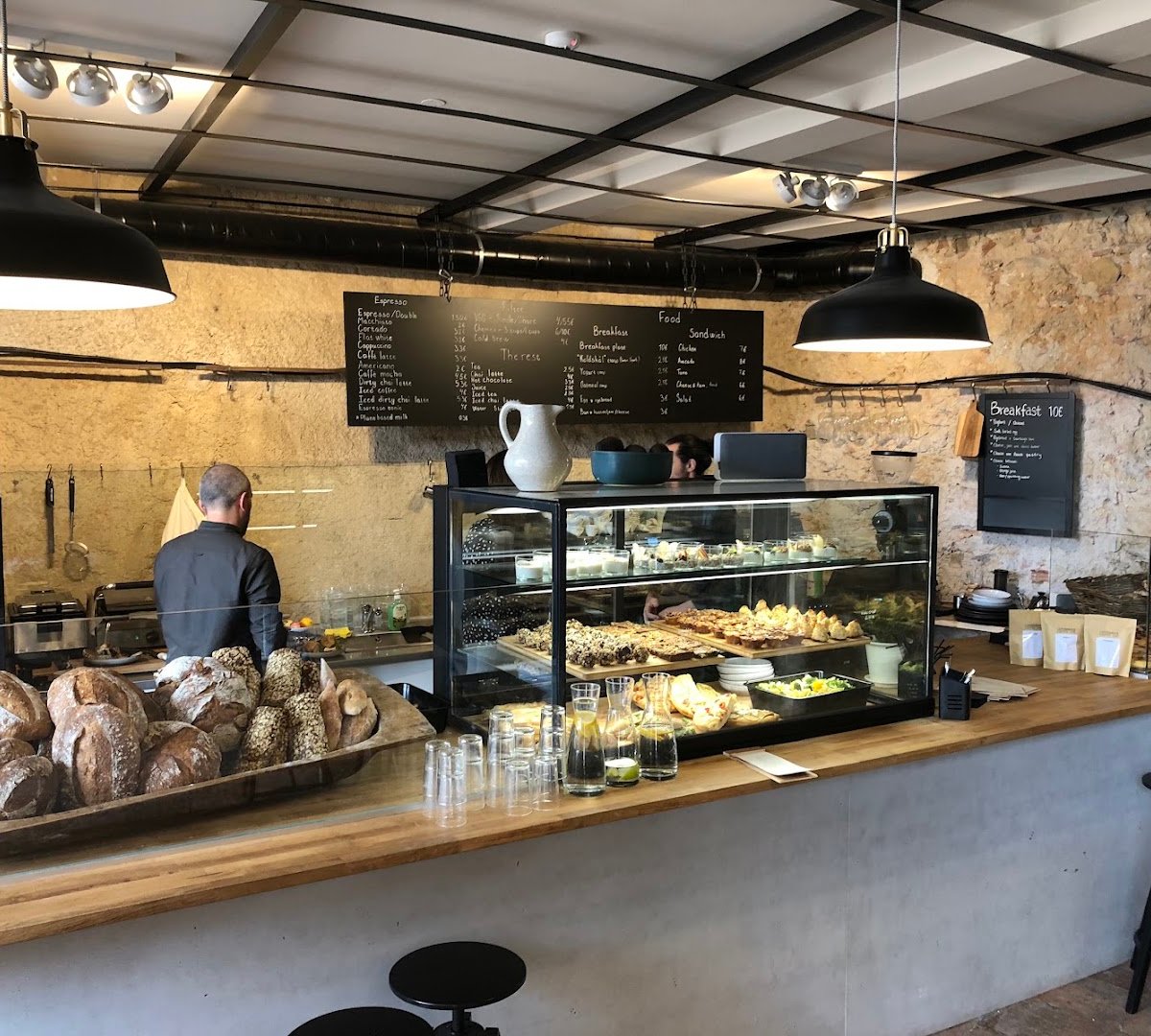 Interior of Copenhagen Coffee Lab Alfama, specialty coffee shop in Lisbon