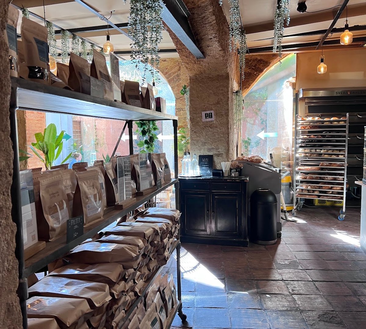 Interior of Copenhagen Coffee Lab Alfama, specialty coffee shop in Lisbon