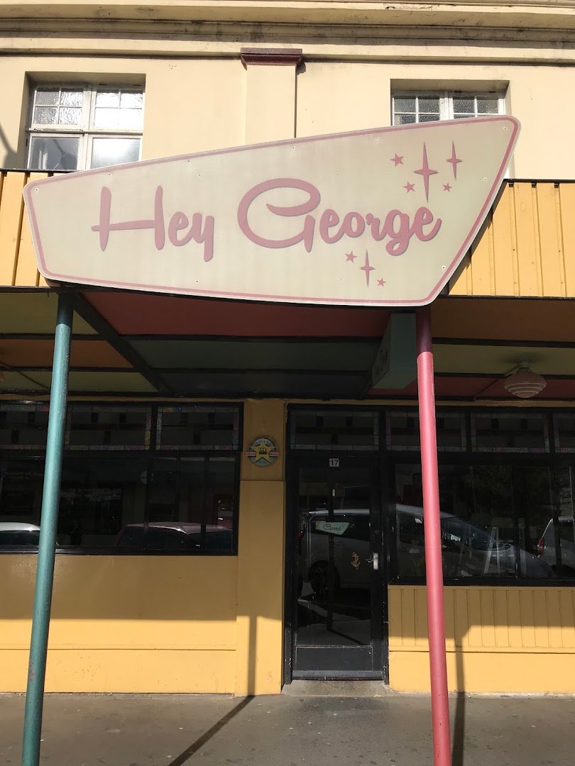 Signage at Hey George Cafe, specialty coffee shop in Wellington