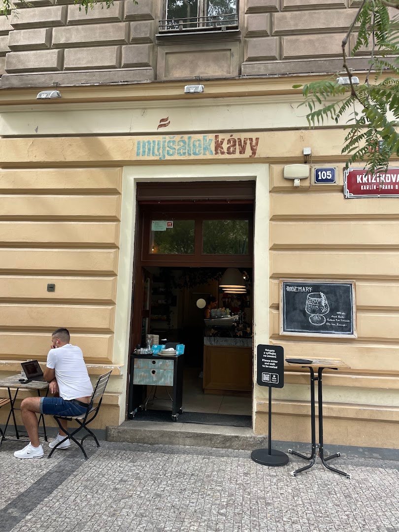 Storefront of Můj šálek kávy, specialty coffee shop in Prague
