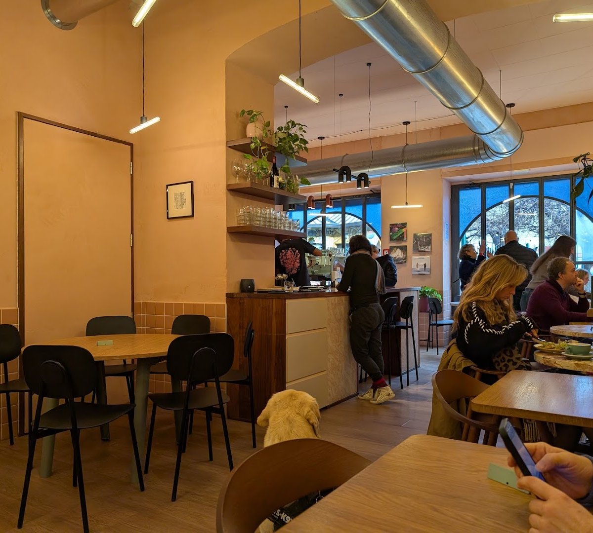 Interior of NOWHERE - CAFE, specialty coffee shop in Milan