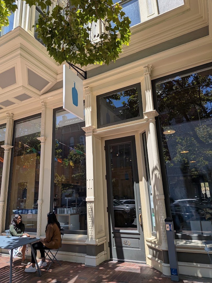Storefront of Blue Bottle Coffee, specialty coffee shop in Oakland