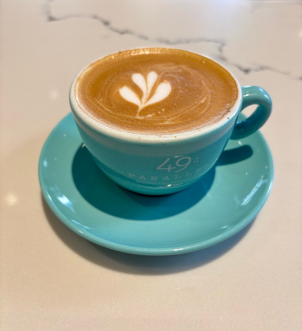 Coffee at 49th Parallel Café & Lucky’s Doughnuts - McGill, specialty coffee shop in Montreal