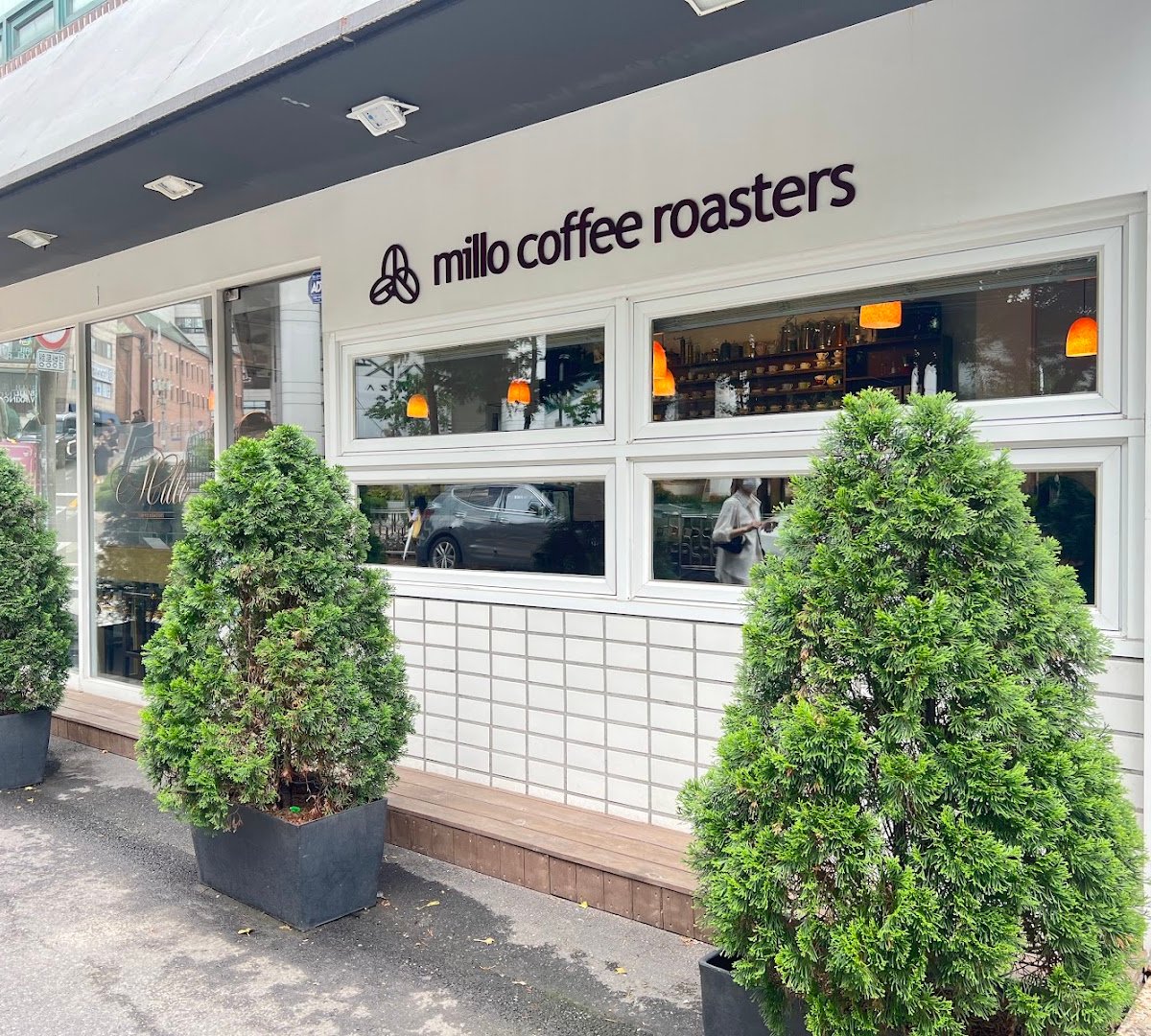Storefront of Millo Coffee Roasters, specialty coffee shop in Seoul