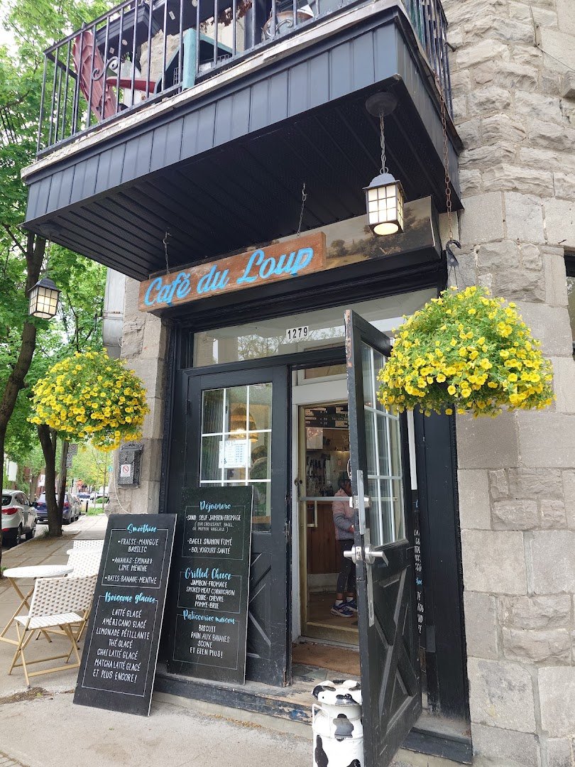 Storefront of The Blue Wolf Cafe, specialty coffee shop in Montreal