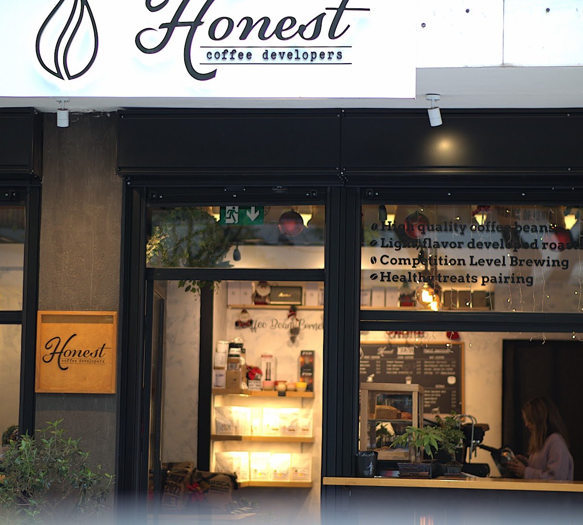 Storefront of Honest Coffee Developers, specialty coffee shop in Athens