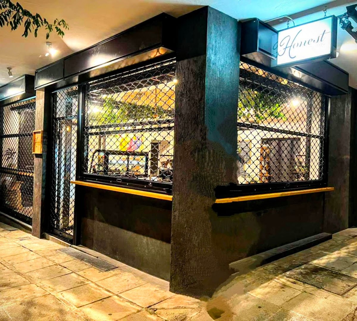Storefront of Honest Coffee Developers, specialty coffee shop in Athens