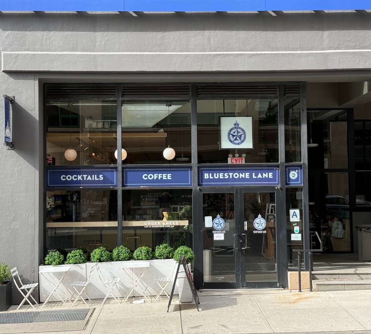 Storefront of Bluestone Lane DUMBO Café, specialty coffee shop in New York