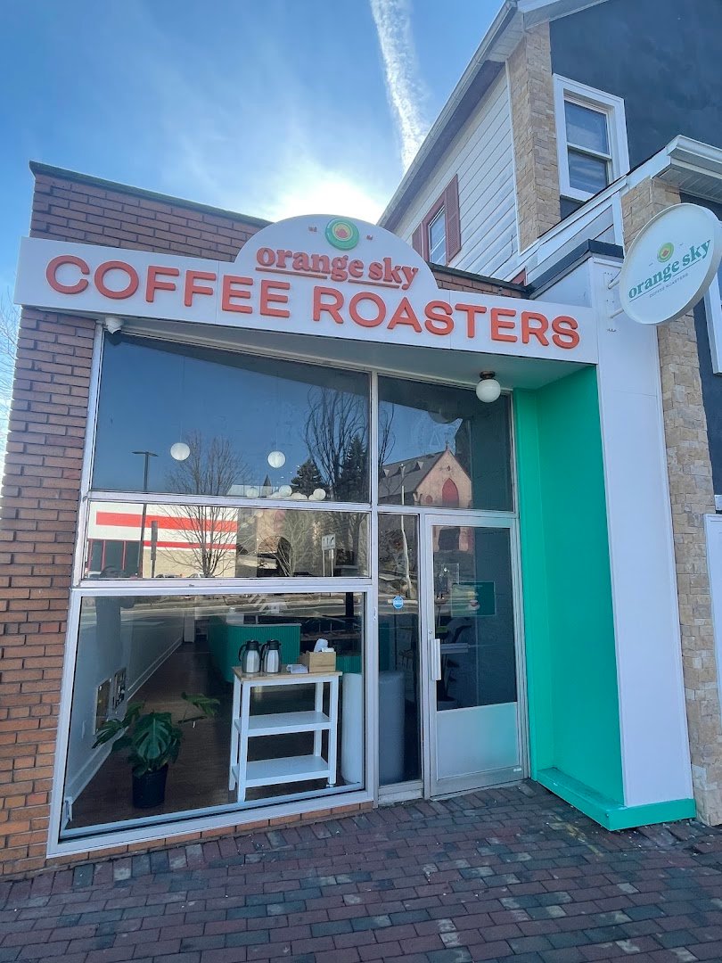 Storefront of Orange Sky Coffee Roasters, specialty coffee shop in Newark