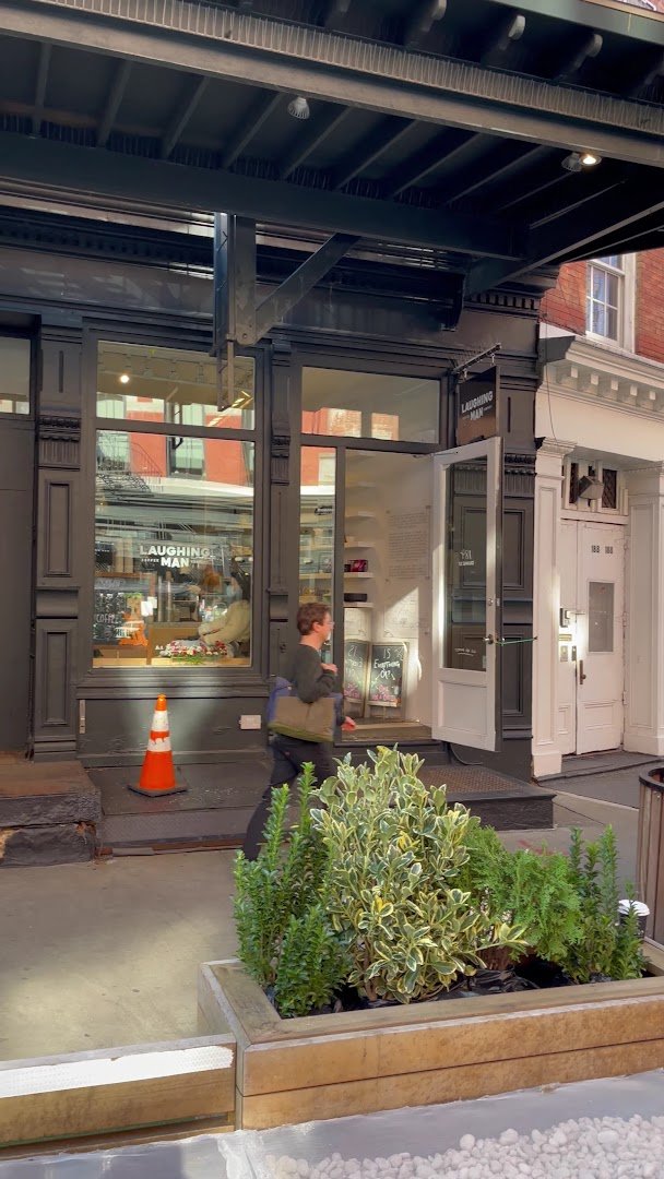 Storefront of Laughing Man Cafe, specialty coffee shop in New York