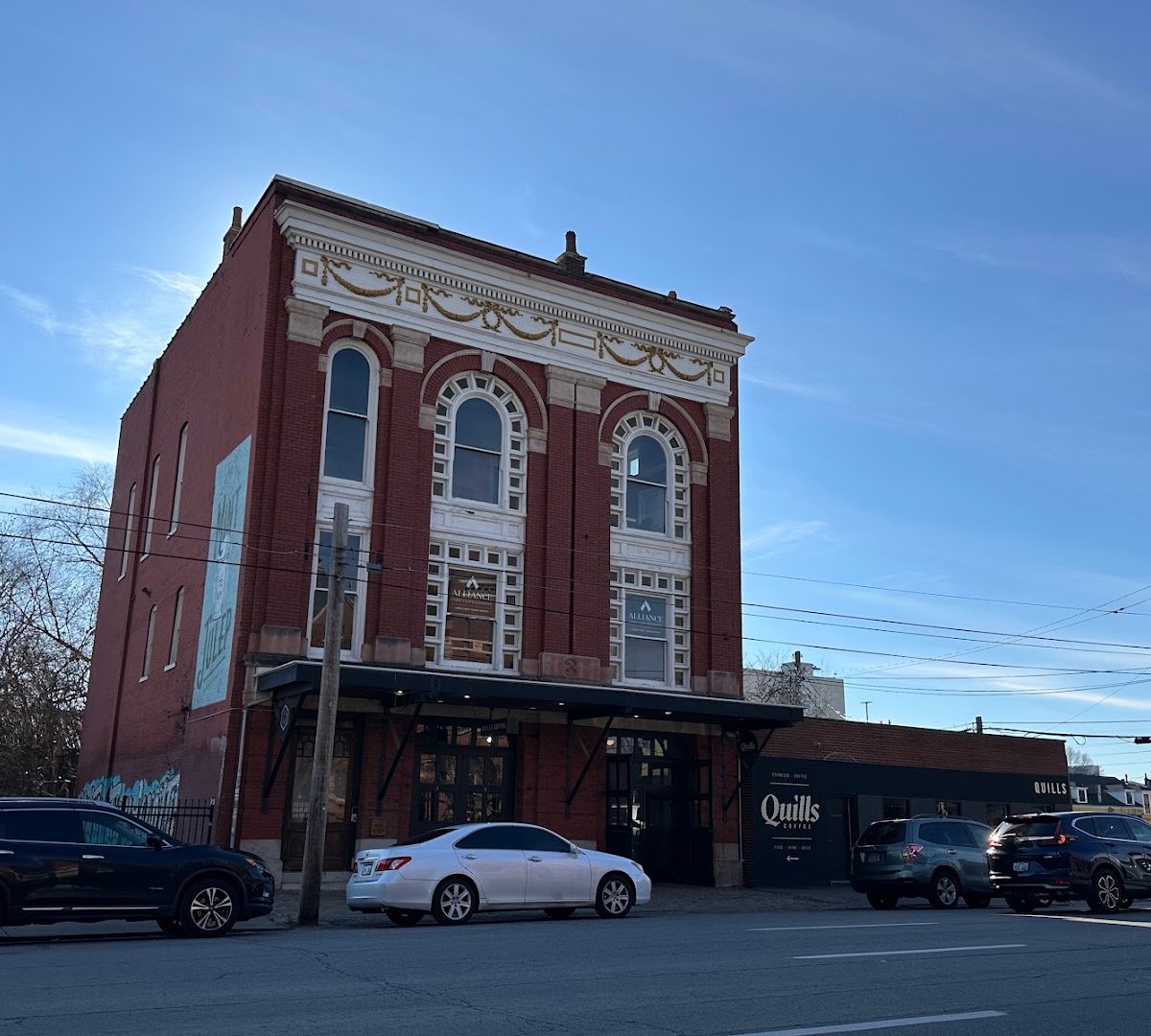 Storefront of Quills Coffee, specialty coffee shop in Louisville