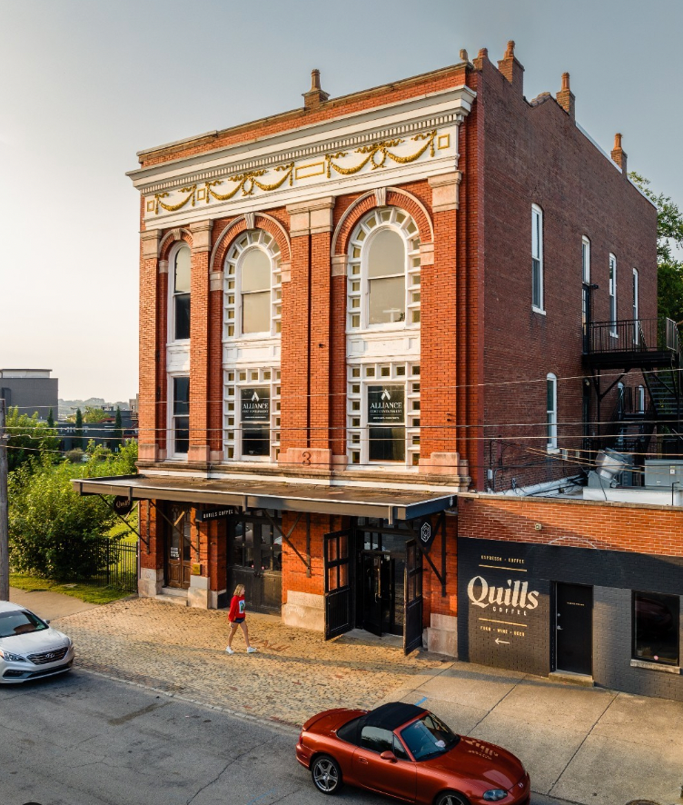 Storefront of Quills Coffee, specialty coffee shop in Louisville
