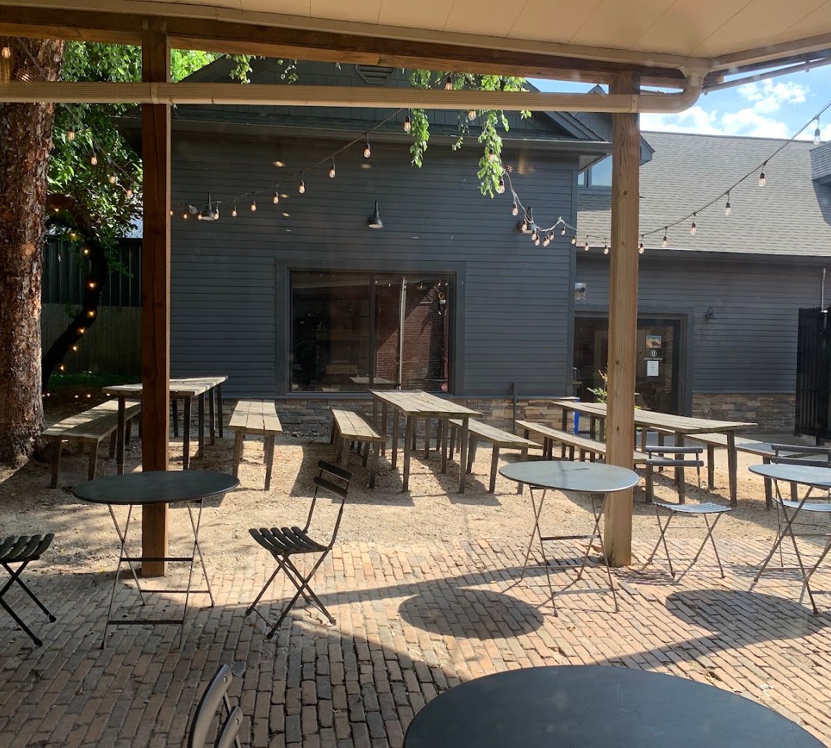 Storefront of Quills Coffee, specialty coffee shop in Louisville