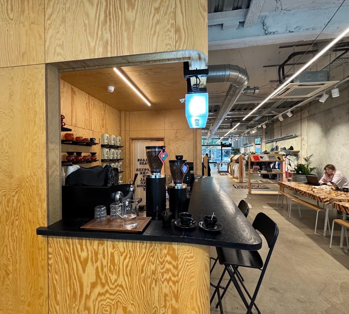 Interior of Nowhere - Dark Arts @ Aries (Soho), specialty coffee shop in London