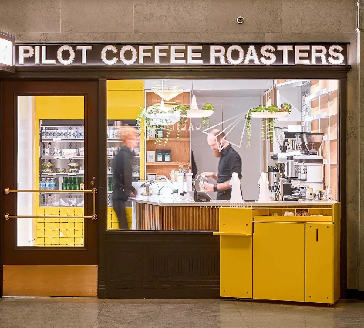 Storefront of Pilot Coffee Roasters, specialty coffee shop in Toronto