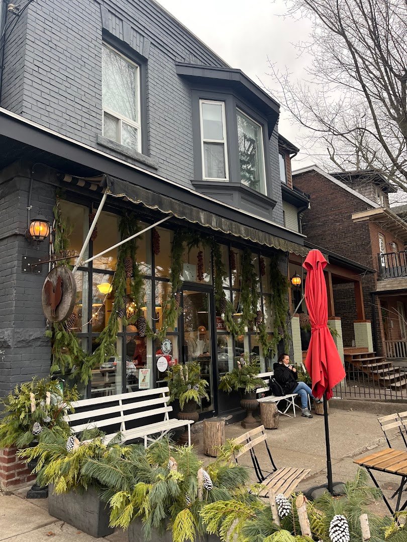 Storefront of Rooster Coffee House, specialty coffee shop in Toronto