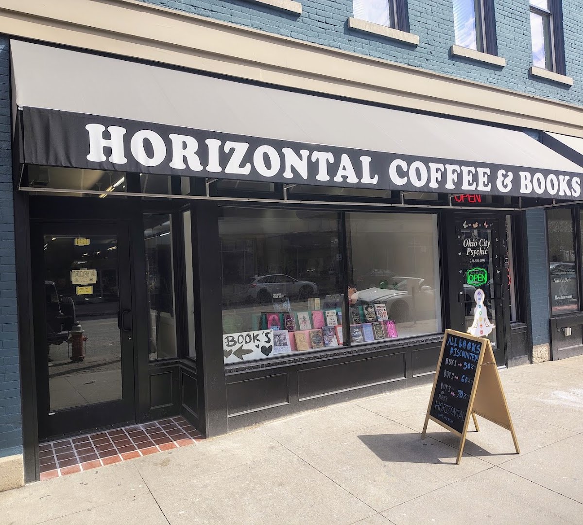 Storefront of Horizontal Coffee & Books, specialty coffee shop in Cleveland