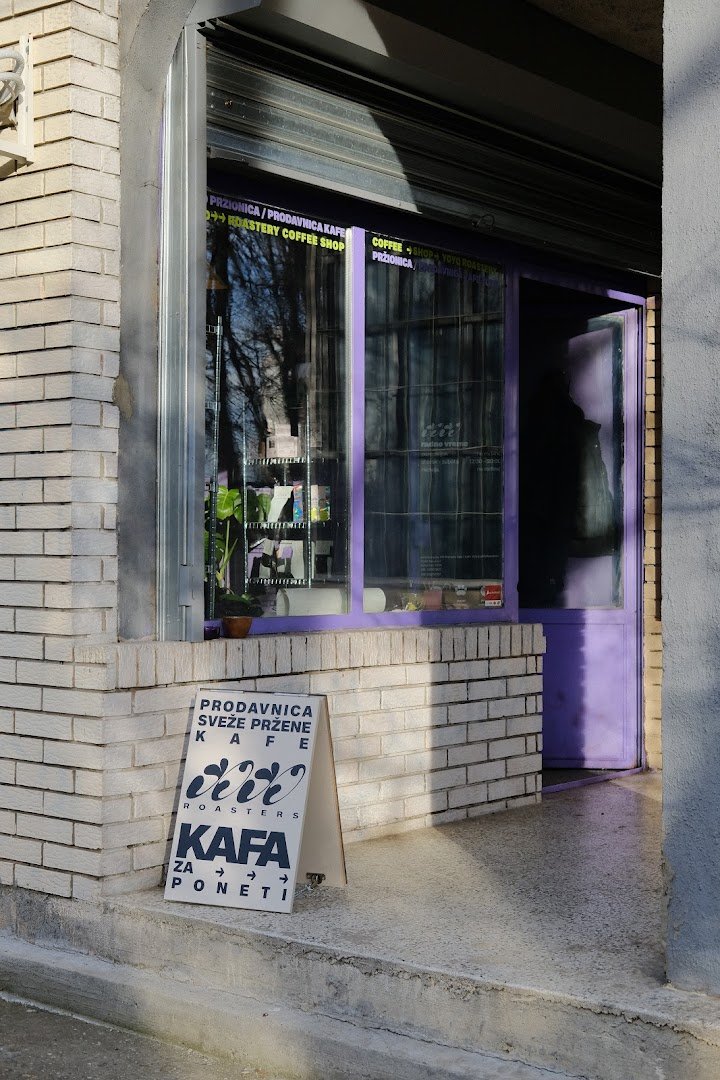 Storefront of YoYo Coffee Roasters, specialty coffee shop in Belgrade