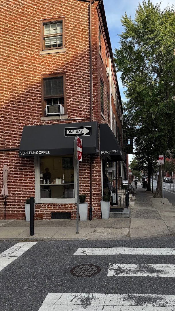 Storefront of Suprema Coffee Roastery, specialty coffee shop in Philadelphia